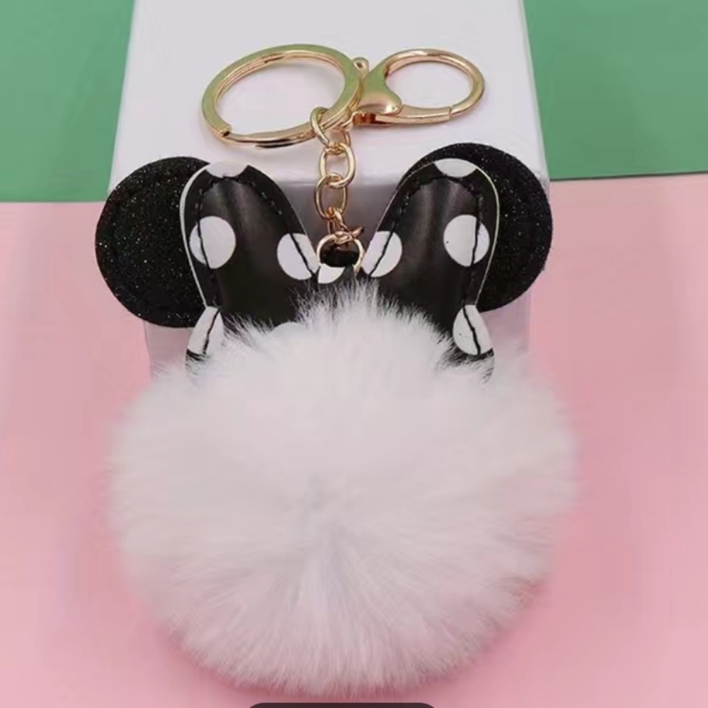 NWT Minnie Mouse fluffy pom pom bag charm, white polka dot bow